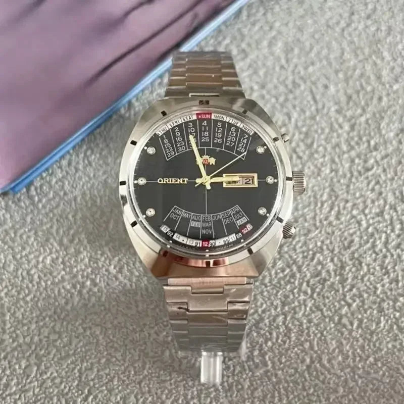 118A Store Orient automatic mechanical unisex watch with large rotating dial, fully functional stainless steel Japanese movement