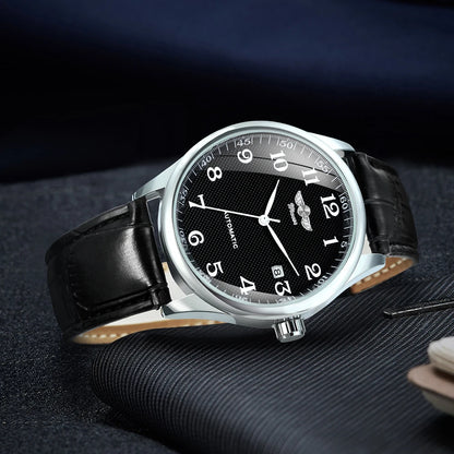 Reloj clásico para hombre: estilo retro con calendario y agujas azules, movimiento mecánico automático, marca de prestigio, caja de acero y correa de piel