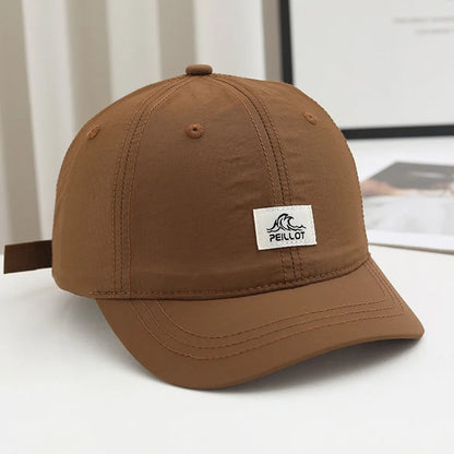Eine Herren-Kappe mit kurzer Krempe, neuer Sommer-Style, atmungsaktive und schnell trocknende Baseballkappe, leichte Soft-Top-Duckbill-Kappe für Damen