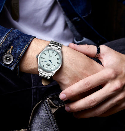 Reloj clásico para hombre: estilo retro con calendario y agujas azules, movimiento mecánico automático, marca de prestigio, caja de acero y correa de piel