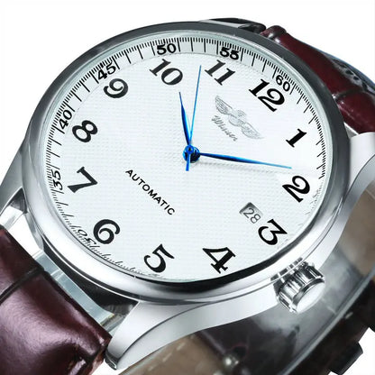 Reloj clásico para hombre: estilo retro con calendario y agujas azules, movimiento mecánico automático, marca de prestigio, caja de acero y correa de piel